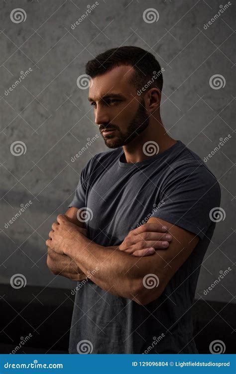 Sad handsome man standing stock photo. Image of sadness - 129096804