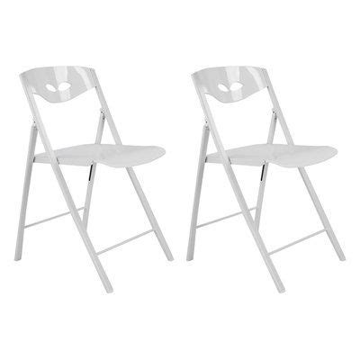 Two White Folding Chairs Sitting Next To Each Other