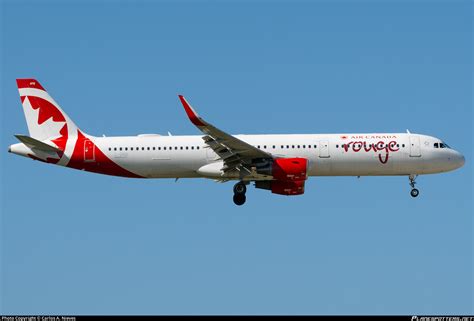 C GHQI Air Canada Rouge Airbus A321 211 WL Photo By Carlos A Nieves