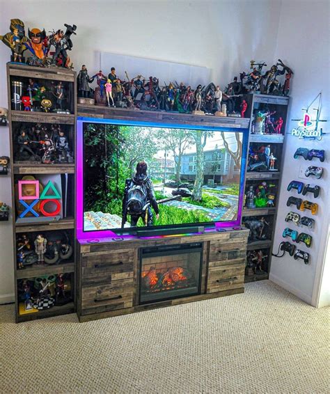 An Entertainment Center With A Large Television And Many Toy Action