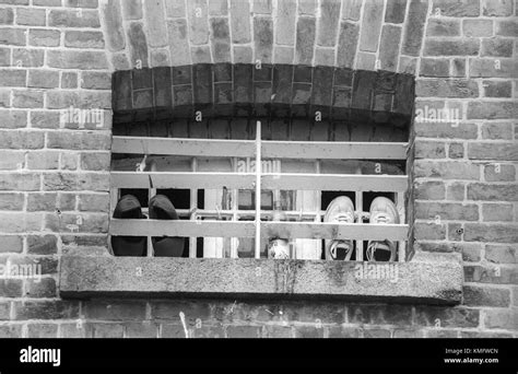 Inmates footwear airing on cell window at HMP Winchester prison ...