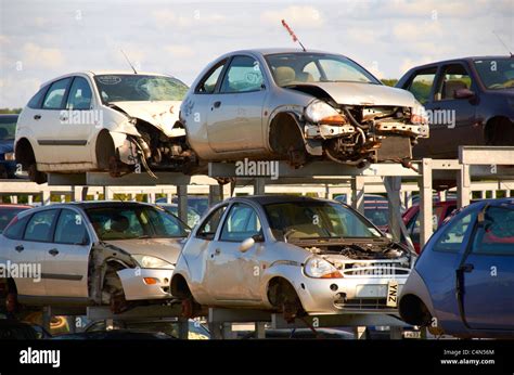 Cars Stacked Up In A Scrapyard Stock Photo Alamy