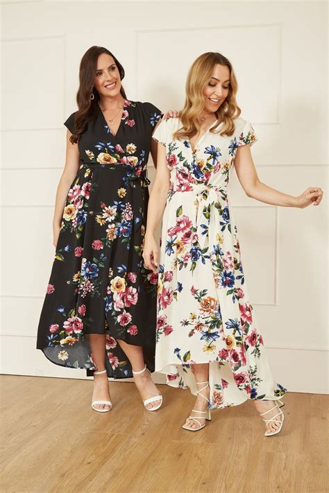 Mela Black Floral Wrap Over Dipped Hem Midi Dress Mela