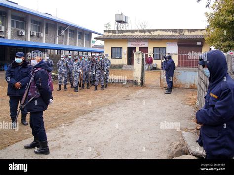 Security Officers Stand Guard Outside A Mortuary Of A Hospital Where