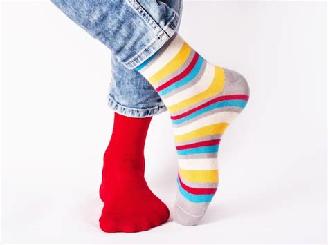 Premium Photo Men S Legs And Bright Socks Without Shoes