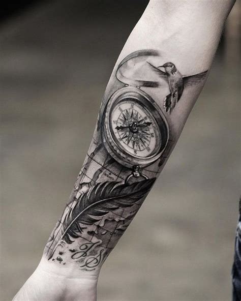 Picture Of Compass And Feather Forearm Tattoo With A Bird