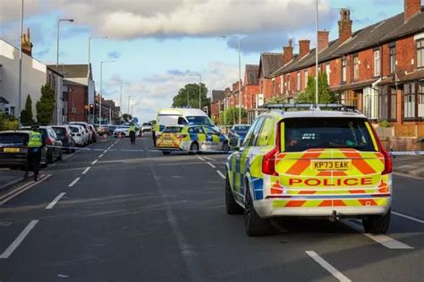 Police Close Road After Crash Between Cyclist And Car As Man Taken To