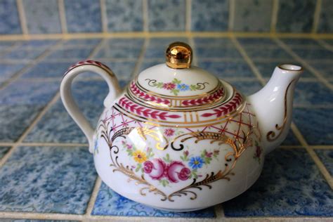 Sorelle Fine Porcelain China Teapot with matching cup and saucer Set