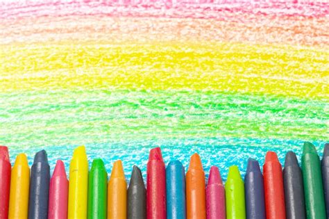 Colorful Crayons And Drawing Of The Rainbow Stock Photo Image Of