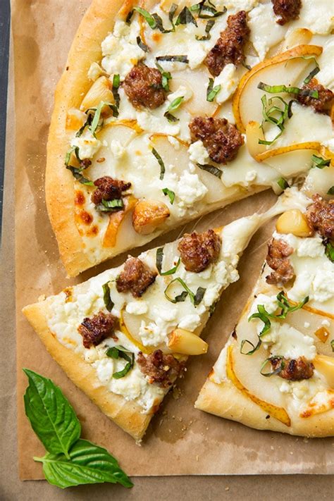 Pear Goat Cheese And Italian Sausage Pizza With Roasted Garlic And