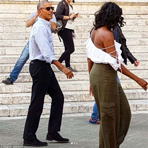 Michelle Obama Steps Out In Shoulder Baring Top In Tuscany Daily Mail