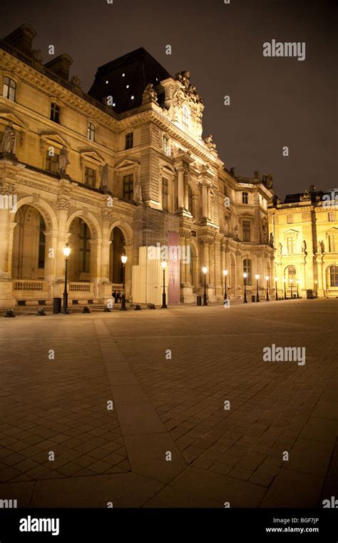 Louvre Museum at night Stock Photo - Alamy