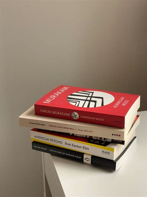 Three Books Stacked On Top Of Each Other