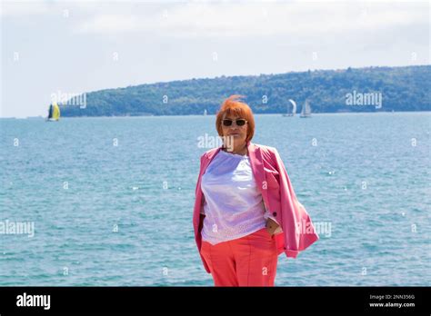 Senior Elegant 73 Years Old Lady On A Walk On Nice Spring Day At Varna