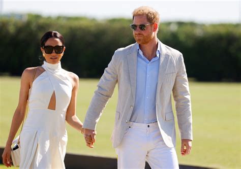 Prince Harry, Meghan share celebratory kiss after charity polo match ...