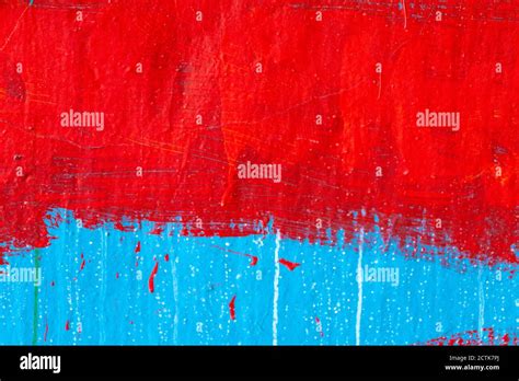 stone wall with blue and red paint. background for designer Stock Photo ...