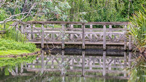 Bridge Over Still Waters A Lovely Bridge Over The Ponds At Flickr