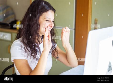 girl speaking sign language on video call Stock Photo - Alamy