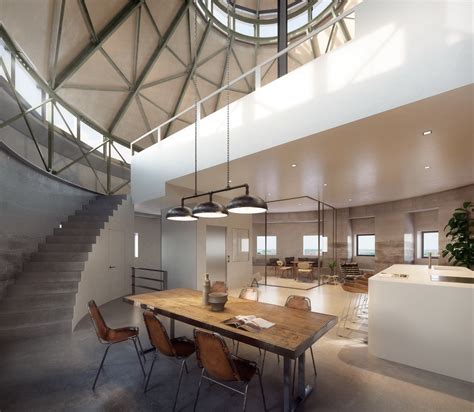 a dining room and living room with stairs leading up to the second floor in an open space