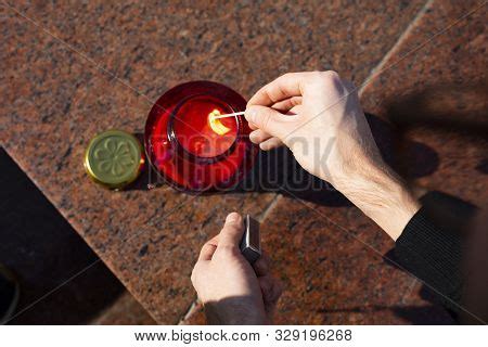 Lighting Grave Candle Image & Photo (Free Trial) | Bigstock