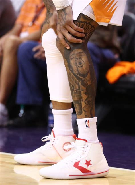 Detailed view of tattoos on the leg of Phoenix Suns forward Kelly Oubre ...