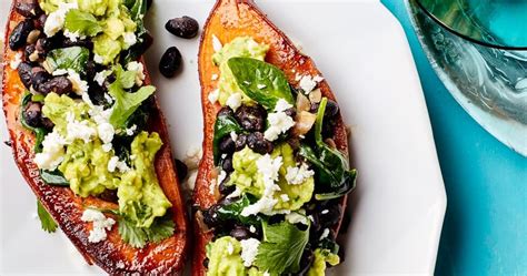 Stuffed Sweet Potatoes With Black Beans Spinach And Guacamole Punchfork