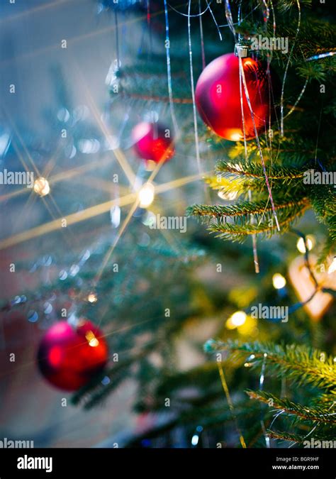 Decorations in a Christmas tree, Sweden Stock Photo - Alamy