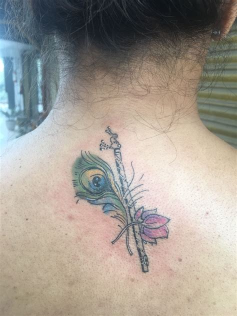 #peacockfeather #flutetattoo #lotustattoo #Devilstattoo | Flute tattoo ...