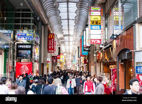 View along the crowded Shinsaibashi-suji covered shopping arcade in ...