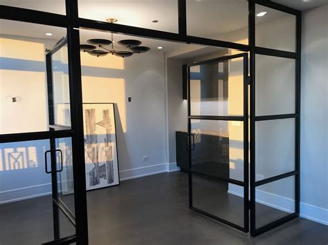 Sleek Modern Steel And Glass Wall With French Doors Fabricated By