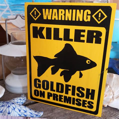 Killer Goldfish Warning Sign