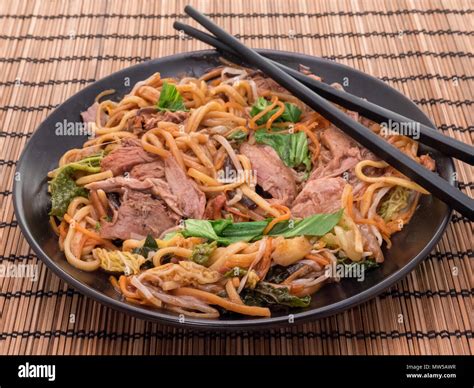 Hoisin duck with noodles Stock Photo - Alamy