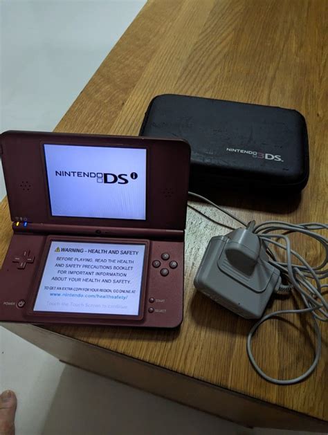 DSi Xl Burgundy With 5 Games Console With Lego Star Wars Mario Sonic