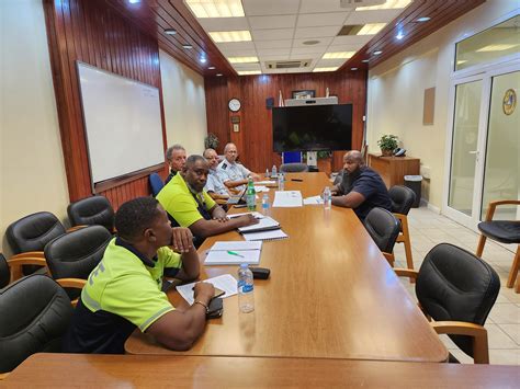 Members of the Sint Maarten Police force me with one of the members of