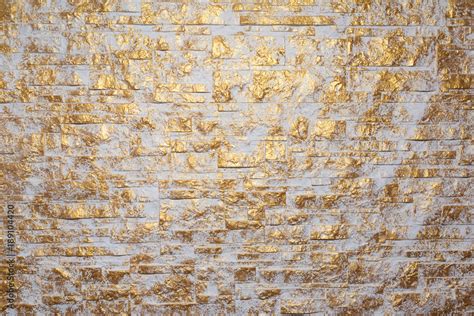 Bricks Wall Painted In White And Gold Background And Texture