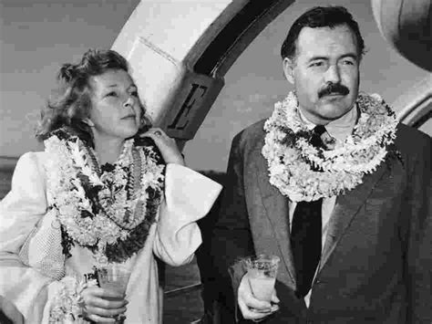 Martha Gellhorn and Ernest Hemingway in 1941 standing on deck aboard a ...