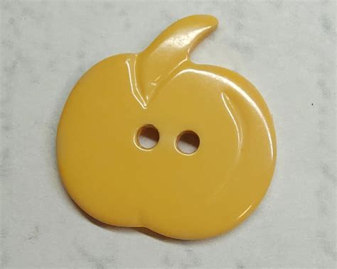 Realistic Vintage Butterscotch Bakelite Fruit Or Vegetable Button