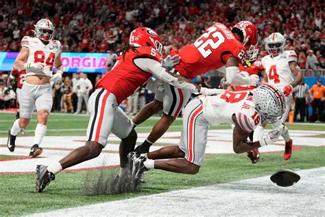 Georgias Bullard Signs Photo Of Ohio States Marvin Harrison Jr Hit