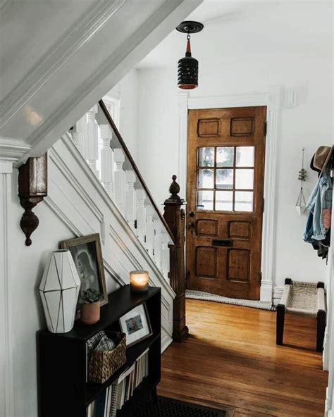 Entryway With Black And Brown Light Fixture Soul Lane