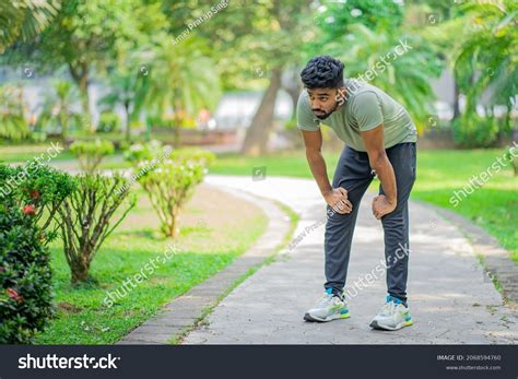 Tired Young Man Runner Taking Rest Stock Photo 2068594760 Shutterstock