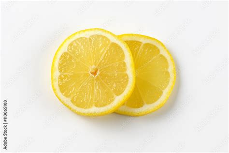 two lemon slices Stock Photo | Adobe Stock