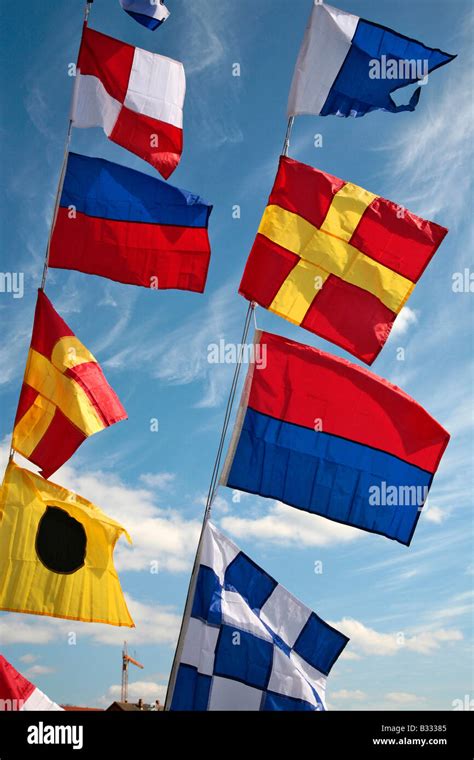 Multicolored Flags In The Wind Stock Photo Alamy