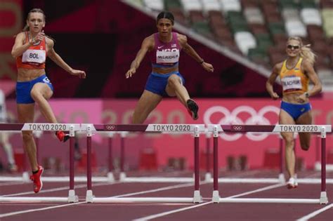 McLaughlin edges Muhammad in battle of world-record hurdlers | AP News