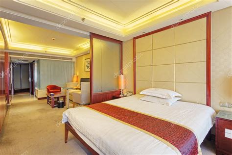 Luxury bedroom in hotel — Stock Photo © zhudifeng #48419507