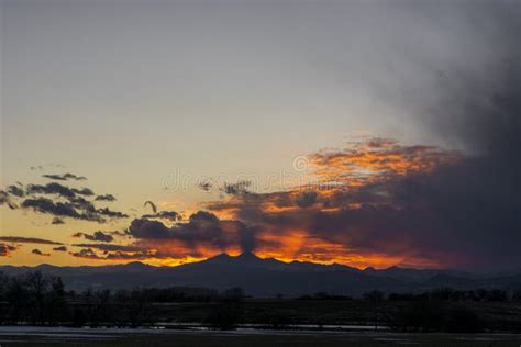 Twin Mountain Peaks Orange Sky Sunset Rays Stock Photo - Image of ...