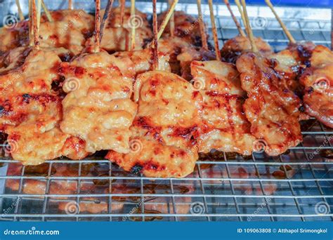 Pork Skewers Are Grilled That Placed On A Grill For Sell At The Market