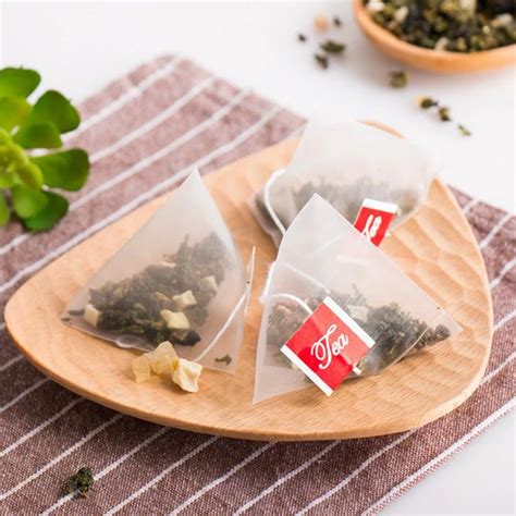 Biodegradable Corn Fiber Pla Reusable Nylon Tea Bag With Logo Tea Filter Pyramid Bag With Draw