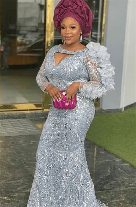 Latest Aso Ebi To Slay In Stylish Naija Lace Gown Styles