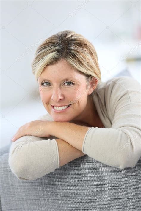 Woman Relaxing In Sofa Stock Photo By Goodluz 58087497