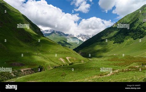 Mountainous Landscape With Gorge Under A Cloudy Sky Georgia Stock